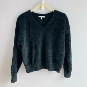 In Excellent Used Condition  This super soft black V neck sweater is just perfec